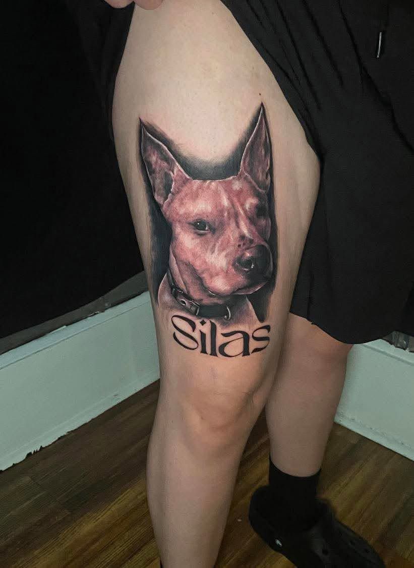 Black and grey portrait of a dog with the name Silas lettered beneath it.